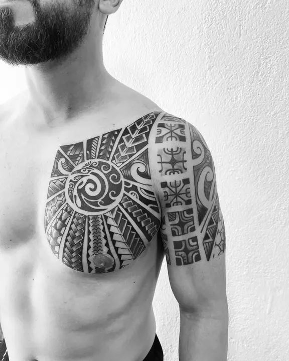Polynesian tribal tattoo on the chest, designed freehand by Leo Martínez at A Sailor's Grave Tattoo, Granollers (Barcelona).